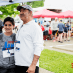 CEO David Davoudpour with his son after the 5k Run.