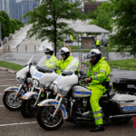 Three police officers on their police bikes