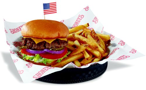A Cheese Burger Basket with french fries and an American flag.